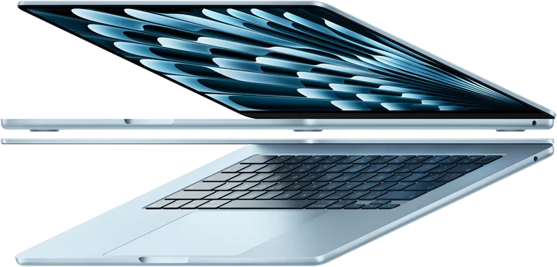 Laptop plateada abierta de perfil